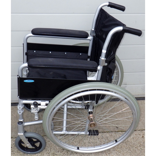 755 - A wheelchair, missing feet rests