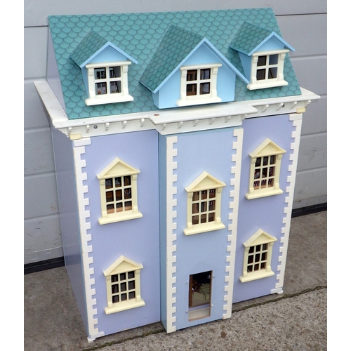 756 - A dolls house and contents, 57cm wide
