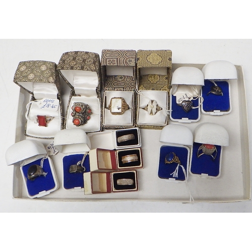 239 - Thirteen various rings incl Oriental white metal and stone set examples.