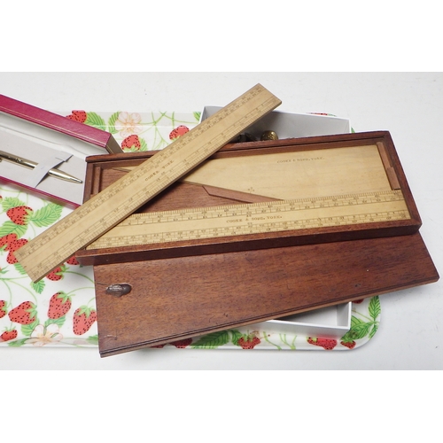 420 - A cased wooden three piece ruler set by  Cooke, York; a cased drawing set, other pens; group of mili... 