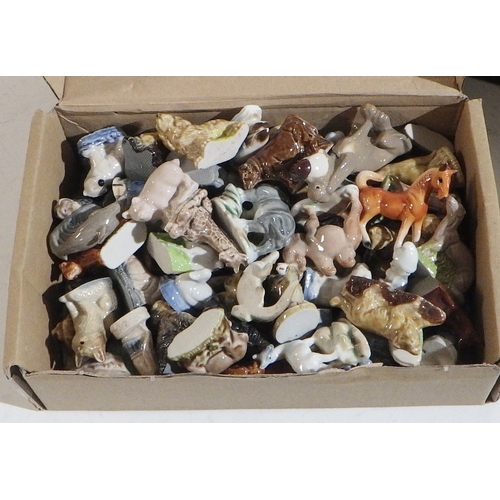 428 - A qty of Wade Whimsies together with misc decoupage scraps and sheets