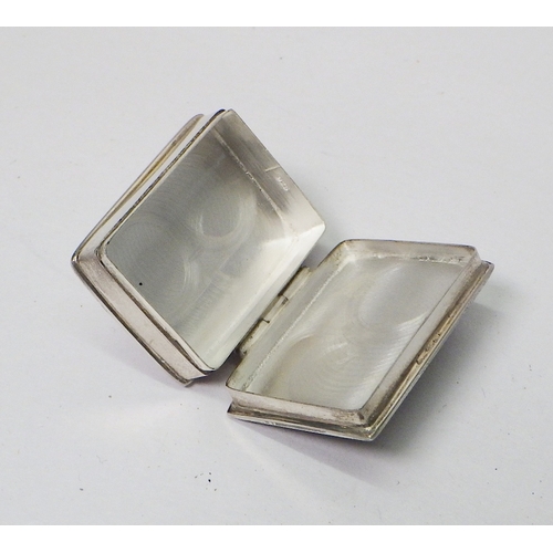 10 - A silver and enamel trinket box, the hinged lid depicting a huntsman, London 2009.  36 x 27mm