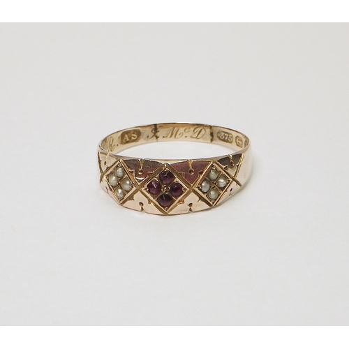 29 - A late Victorian 9ct gold Gothic Revival taste ring set with eight seed pearls and four rubies in th... 