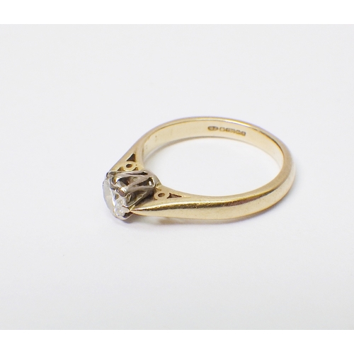 30 - An 18ct gold diamond solitaire ring.  The round cut diamond approx 4.2mm diameter / 2.5g gross.