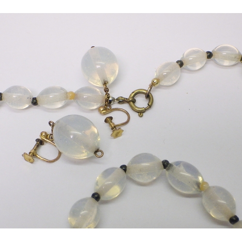 36 - A yellow metal citrine and seed pearl brooch head marked 9ct, c1900 a/f pin removed, 18 x15 mm; a ye... 