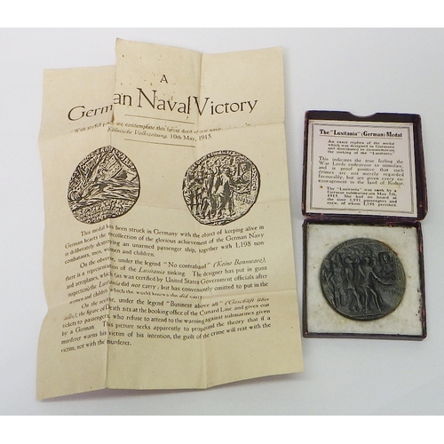 92 - A WW1 Lusitania Medal propaganda plaque, boxed with paper slip.