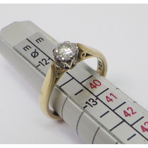 30 - An 18ct gold diamond solitaire ring.  The round cut diamond approx 4.2mm diameter / 2.5g gross.