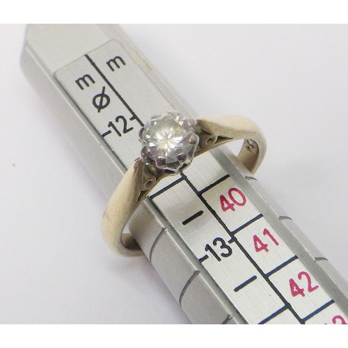 30 - An 18ct gold diamond solitaire ring.  The round cut diamond approx 4.2mm diameter / 2.5g gross.