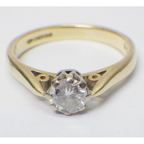 30 - An 18ct gold diamond solitaire ring.  The round cut diamond approx 4.2mm diameter / 2.5g gross.