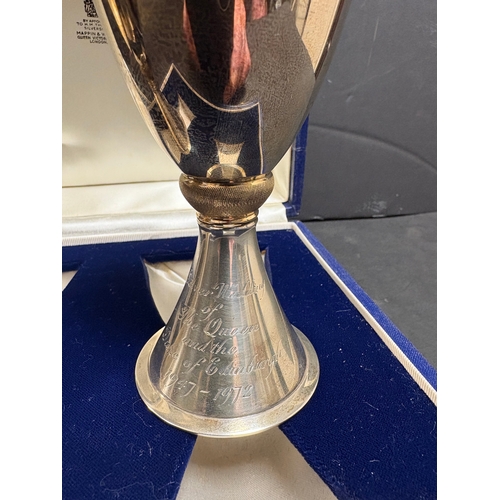 13 - A pair of Mappin & Webb Elizabeth II Royal Silver Wedding silver goblets designed by Colin Hillier, ... 