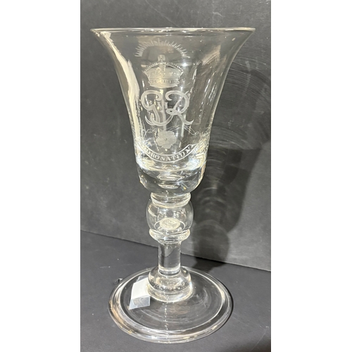 113 - A GVIR bell shaped goblet engraved for the coronation of George VI 1937, enclosed silver coin 24cm t... 