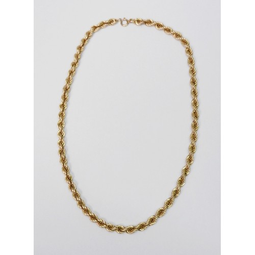 41 - A statement necklace of broad rope twist design, 9ct gold. 510mm long / 6mm diameter / 24g