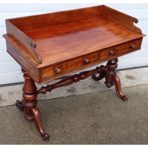 604 - A Victorian mahogany washstand with gallery back, top split, 106cm wide