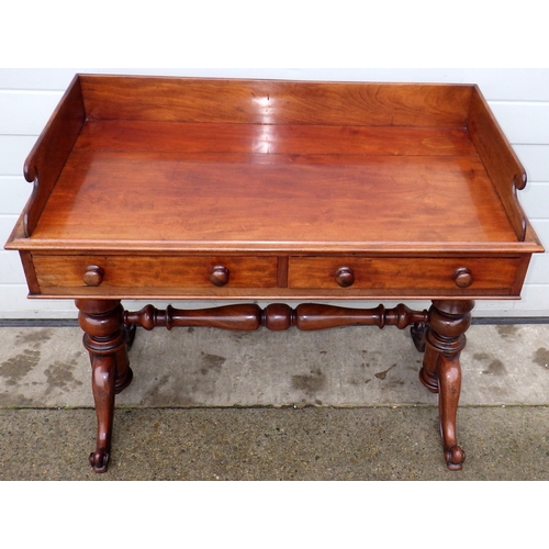 604 - A Victorian mahogany washstand with gallery back, top split, 106cm wide