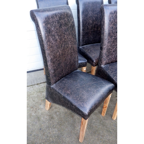 615 - A set of six modern upholstered high backed dining chairs