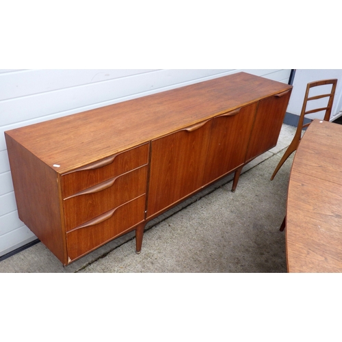 622 - A McIntosh teak dining suite comp dining table with one leaf, six chairs, cracks / repair,  and a si... 