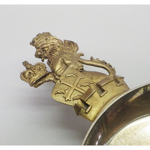 12 - An Elizabeth II Aurum silver and parcel gilt Westminster Abbey Jubilee tasting cup of circular form ... 