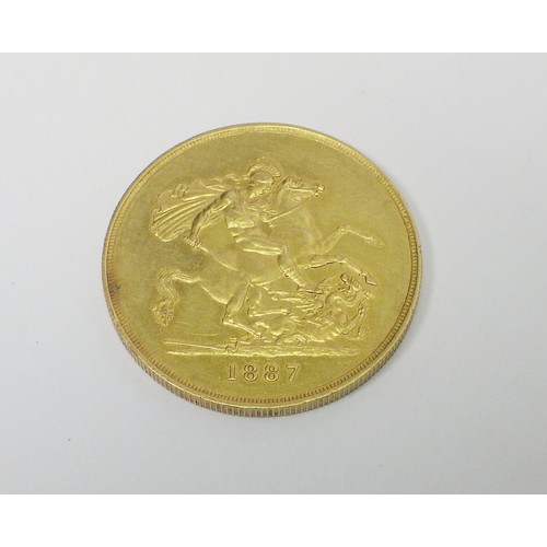81 - A Victoria 1887 five pounds coin.  VAT exempt.
Postage is not available on this lot due to value