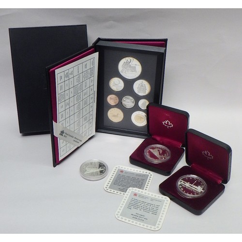 86 - A Canadian 1997 cased coin set comprising a silver proof $1, a silver polar bear $2, a base metal lo... 