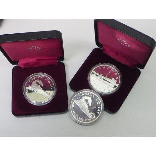 86 - A Canadian 1997 cased coin set comprising a silver proof $1, a silver polar bear $2, a base metal lo... 