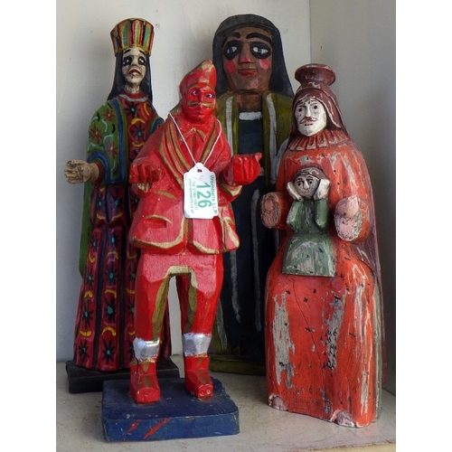 126 - Four South American carved wood folk art figures, 31-40cm tall AF