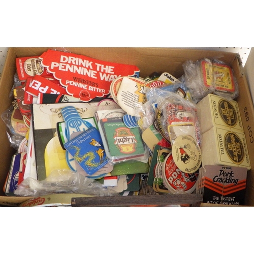 154 - A large qty of beer mats, bar towels etc (2)