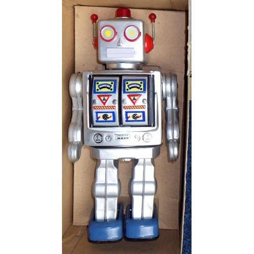 182 - A boxed Spanish flying boat model together with a boxed 'Space Walk Man' robot (2)