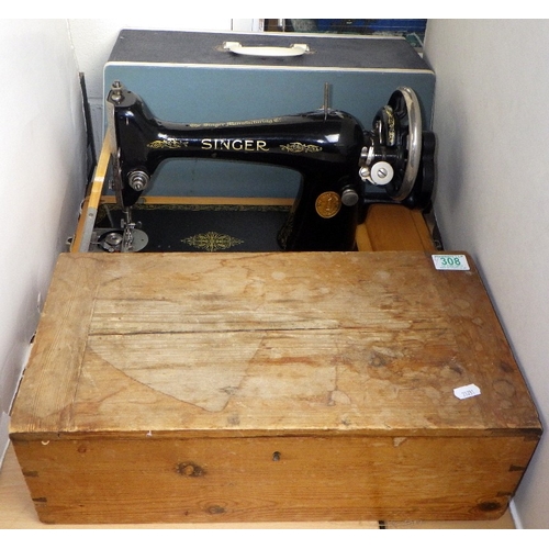 308 - A cased Singer sewing machine together with a wooden box containing accessories