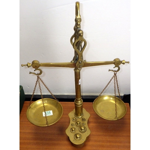 335 - A set of brass scales with weights