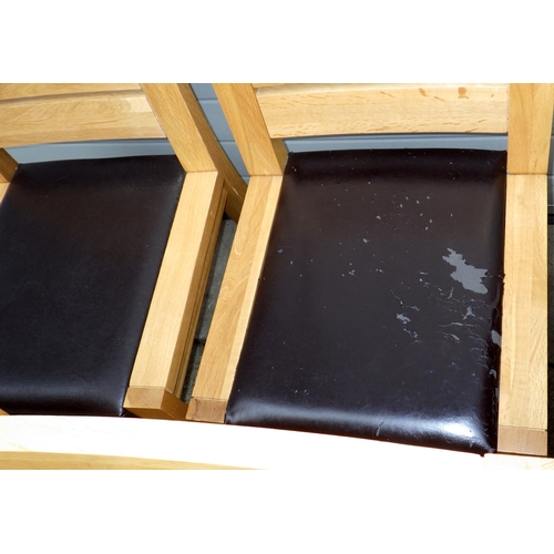 639 - A modern light oak extending dining table with one leaf, 180cm closed x 100cm together with eight ch... 