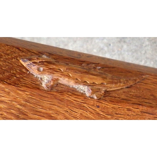 667 - A Lizard man oak spinning chair, water marks, 94cm tall