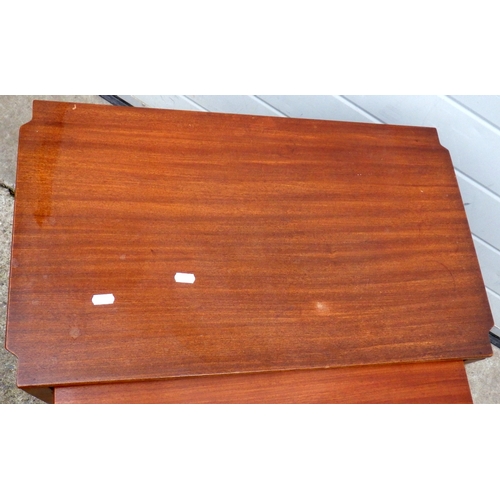 668 - A teak nest of three occasional tables