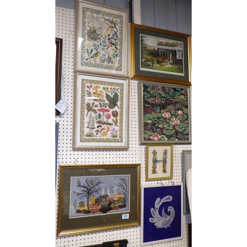 385 - A group of seven needlework pictures (7)