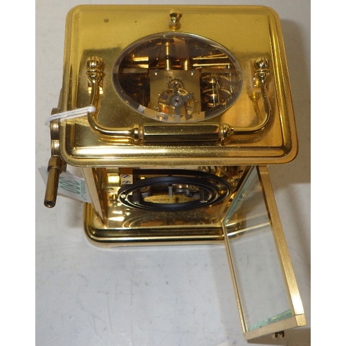 380 - A Matthew Norman London repeating carriage clock striking on a single gong, Swiss movement in a four... 