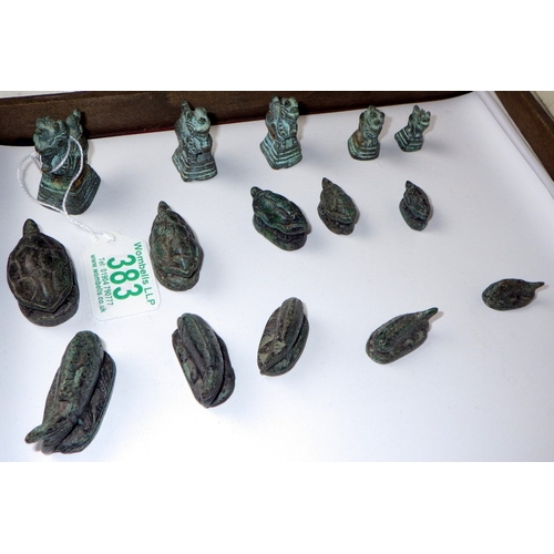 383 - A group of graduated sets of Burmese cast opium weight markers