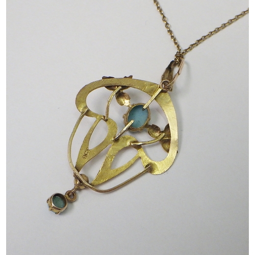 47 - An Art Nouveau pendant set with turquoise stones, yellow metal marked 9ct, the whole presented on an... 