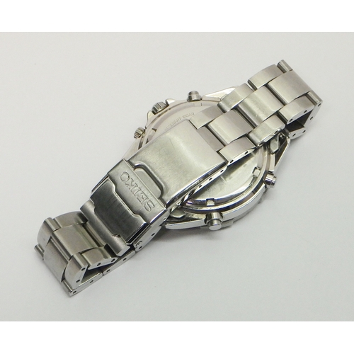 56 - A Seiko Quartz Alarm Chronograph bracelet watch 7T32-7F70, comprising a quartz movement under a yell... 