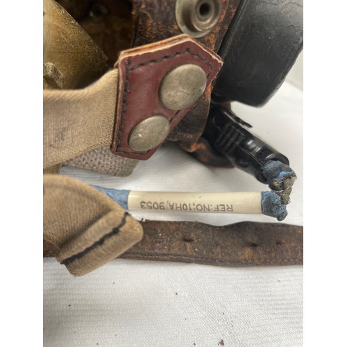 91A - An RAF type C late pattern flying helmet together with a type H oxygen mask having Korean War-era is... 