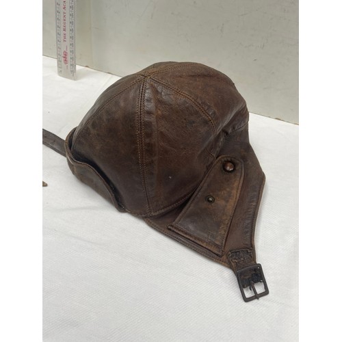 91A - An RAF type C late pattern flying helmet together with a type H oxygen mask having Korean War-era is... 