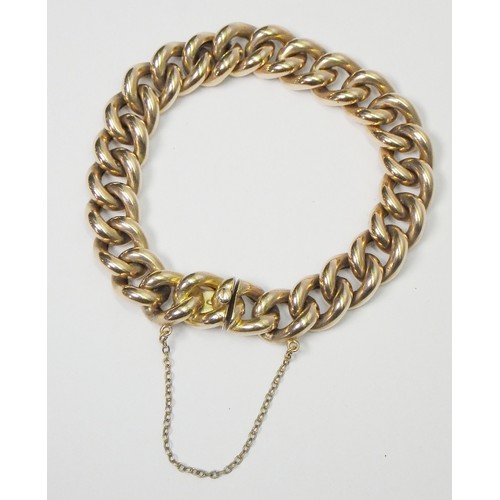41A - A curb chain bracelet, yellow metal marked 15ct. Presented in a period fitted case 