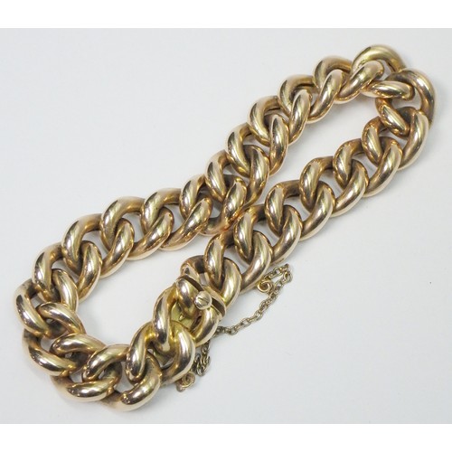 41A - A curb chain bracelet, yellow metal marked 15ct. Presented in a period fitted case 