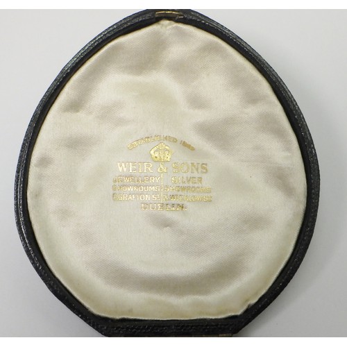 41A - A curb chain bracelet, yellow metal marked 15ct. Presented in a period fitted case 