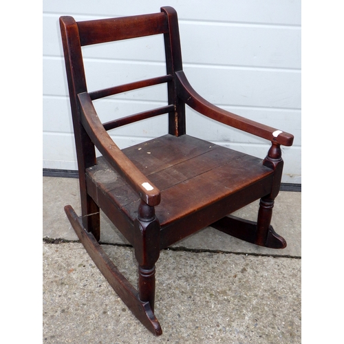 637 - A 19th cen provincial child's rocking chair, worm a/f