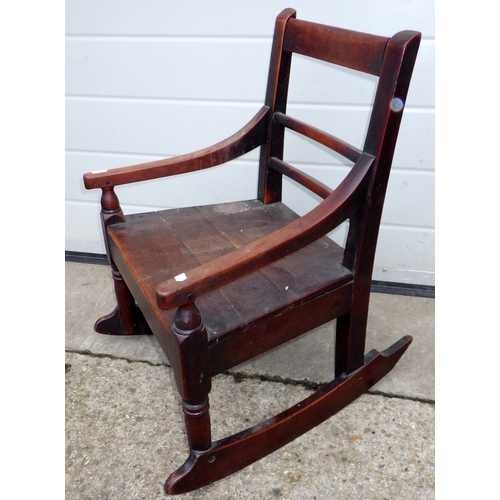 637 - A 19th cen provincial child's rocking chair, worm a/f