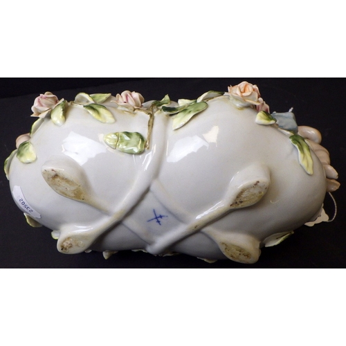 5 - A Meissen bowl decorated with Cherubs, 15cm tall 23cm wide