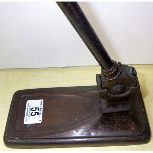 55 - An industrial lamp with a black enamel shade