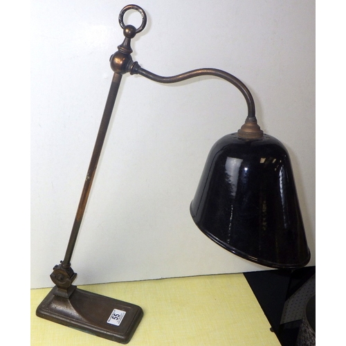 55 - An industrial lamp with a black enamel shade