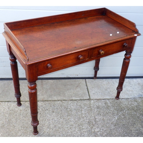 A Victorian mahogany washstand on turned legs, 99cm wide