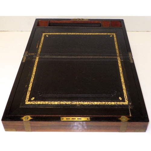 125 - A 19thC brass bound writing box, with secret drawer