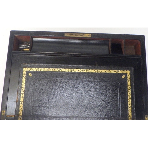 125 - A 19thC brass bound writing box, with secret drawer
